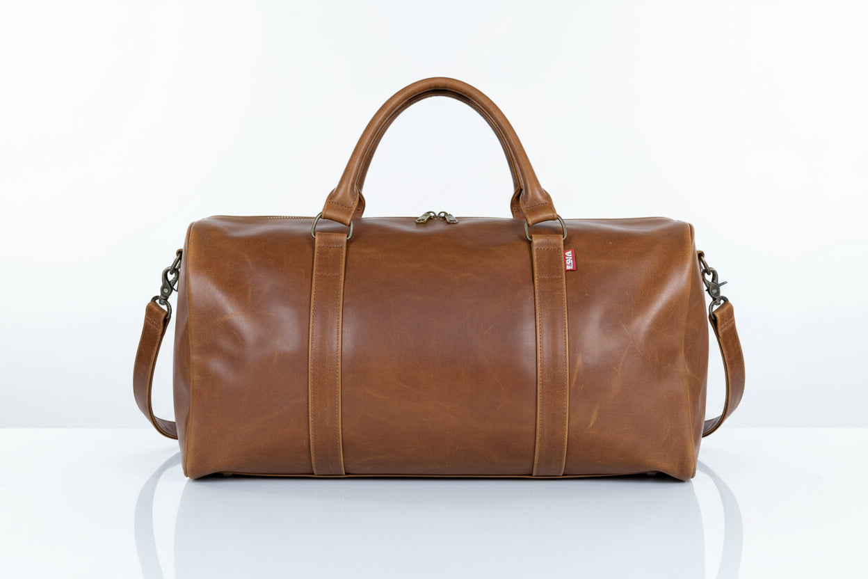 Leather duffel bag for travel or gym Leather lined. Cowboy brown